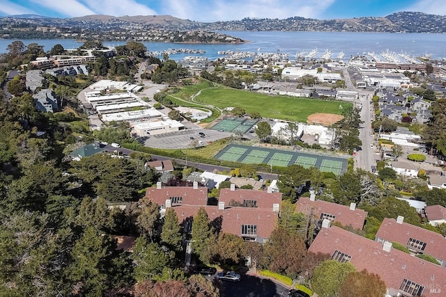 birds eye view of property featuring a water view