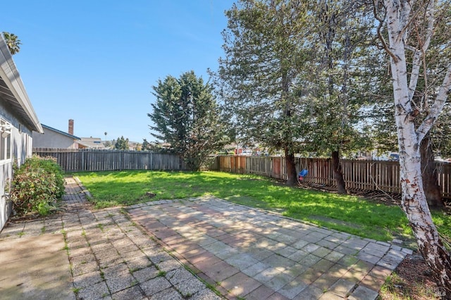 view of patio featuring a fenced backyard