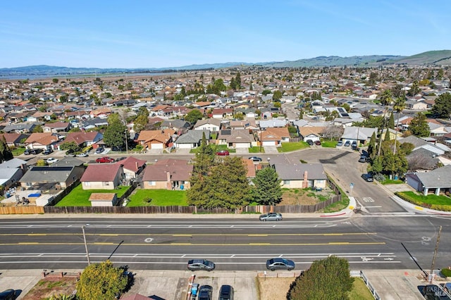 aerial view with a mountain view and a residential view