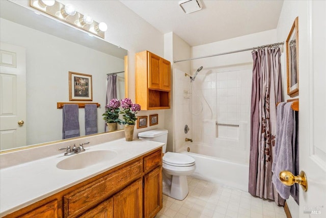 full bath featuring shower / bath combination with curtain, vanity, toilet, and tile patterned floors