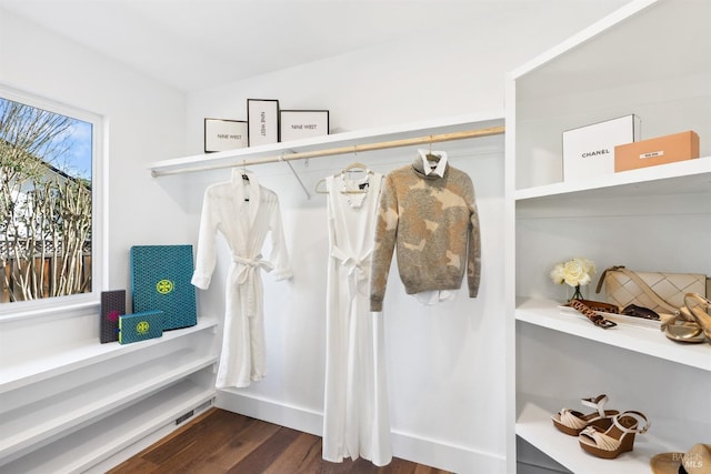 mudroom featuring dark wood-style flooring