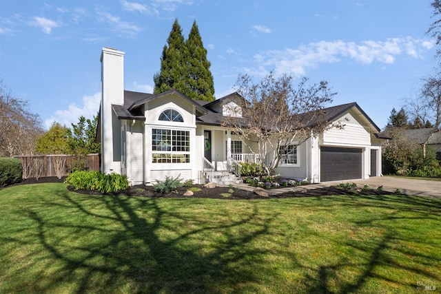 ranch-style home with an attached garage, fence, driveway, a chimney, and a front yard