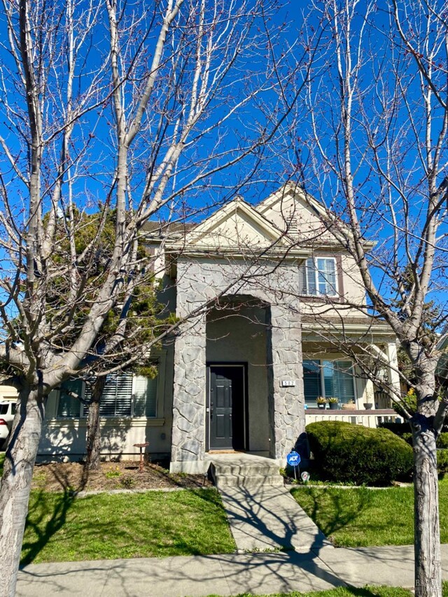 view of front of house with stucco siding