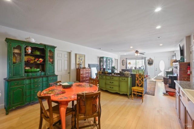 dining area with ceiling fan, light wood finished floors, and recessed lighting