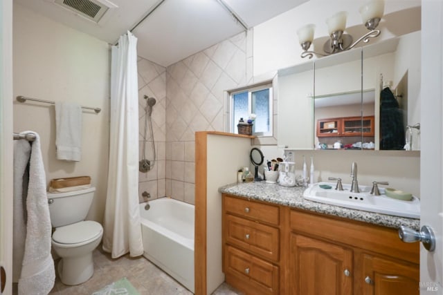 full bath with visible vents, toilet, shower / tub combo, vanity, and tile patterned floors