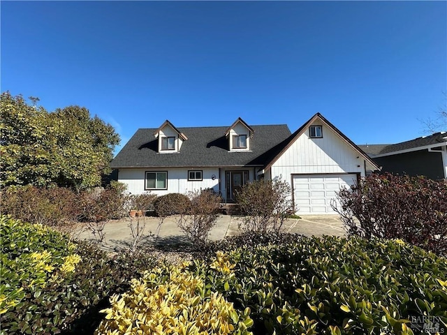 view of front of property with driveway and an attached garage