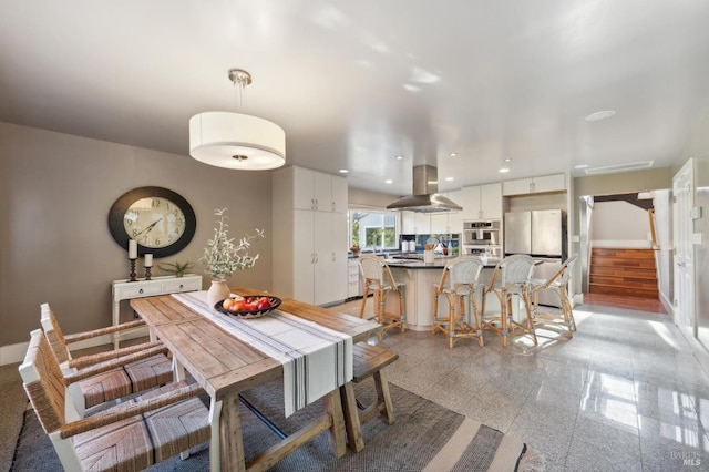 dining room with recessed lighting, granite finish floor, stairway, and baseboards