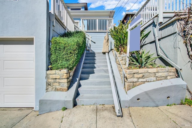 view of property's community featuring stairway