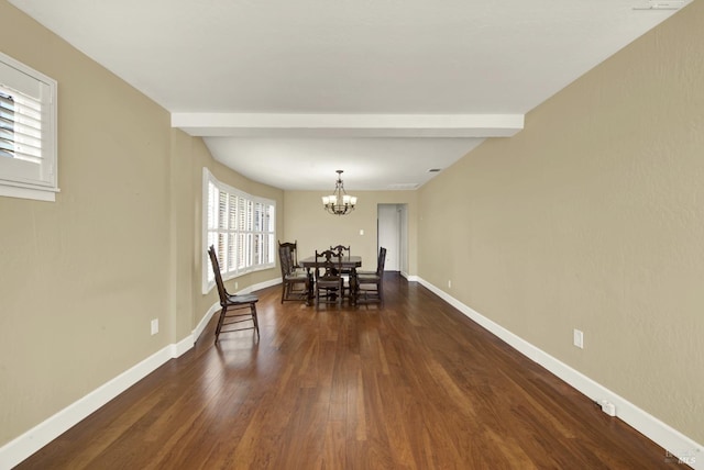 dining area with a chandelier, beamed ceiling, dark wood finished floors, and baseboards