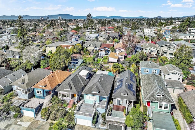 drone / aerial view with a residential view and a mountain view