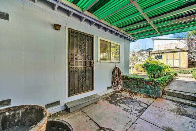 doorway to property featuring visible vents