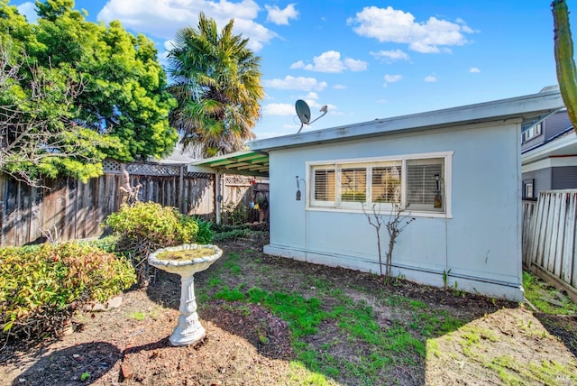 view of property exterior featuring a fenced backyard