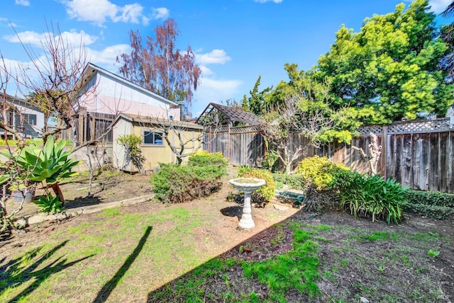 view of yard featuring a fenced backyard