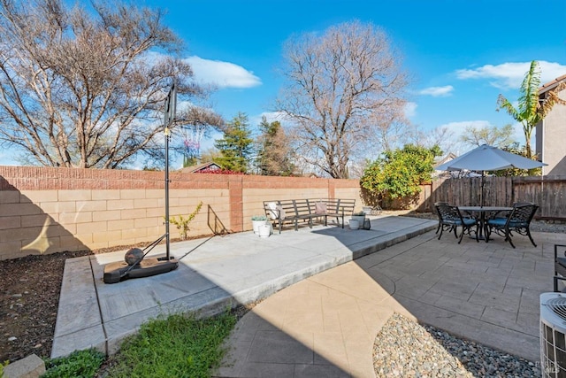 view of patio / terrace with outdoor dining area and a fenced backyard