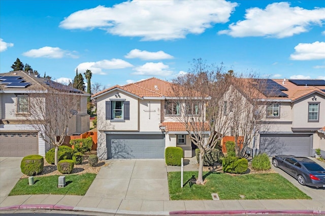 view of front of house featuring stucco siding, driveway, a residential view, a garage, and a tiled roof