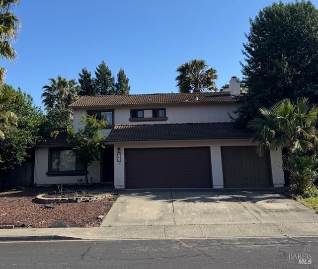 761 Isabella Way, Fairfield, CA 94533 - traditional-style house featuring a tile roof, an attached garage, stucco siding, and driveway