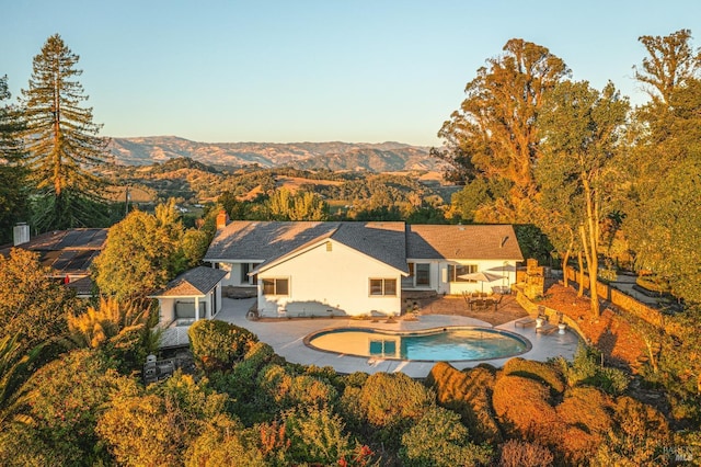 exterior space featuring a mountain view