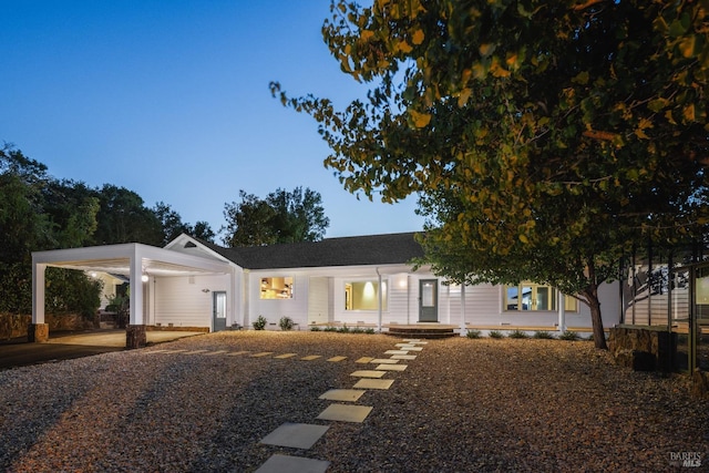 view of front facade with a carport