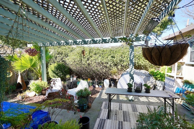 view of patio with a pergola and outdoor dining space