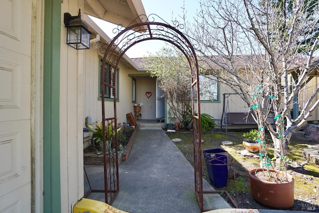 entrance to property featuring a patio