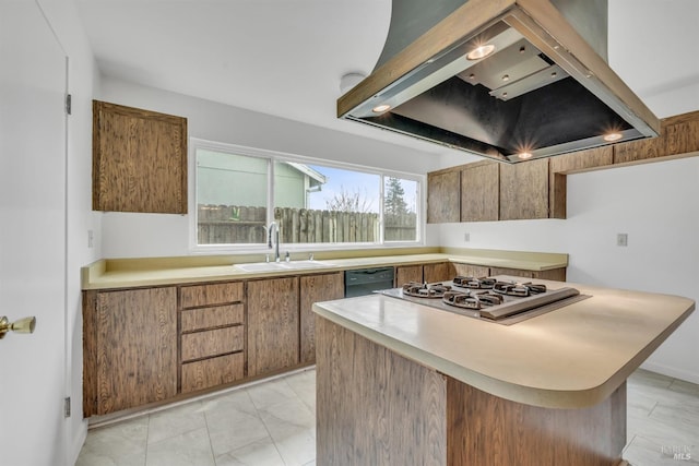 kitchen with a sink, light countertops, dishwasher, wall chimney range hood, and marble finish floor