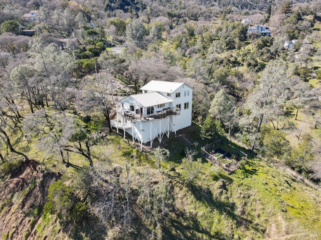 bird's eye view with a view of trees