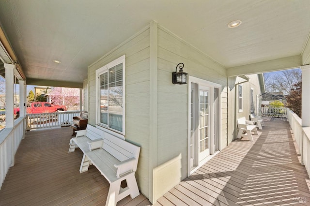 wooden terrace with covered porch