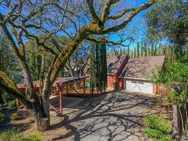 view of front of house with an attached garage and driveway