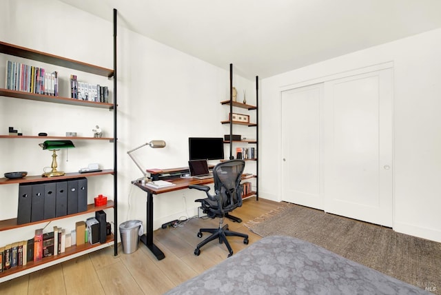 office area with wood finished floors