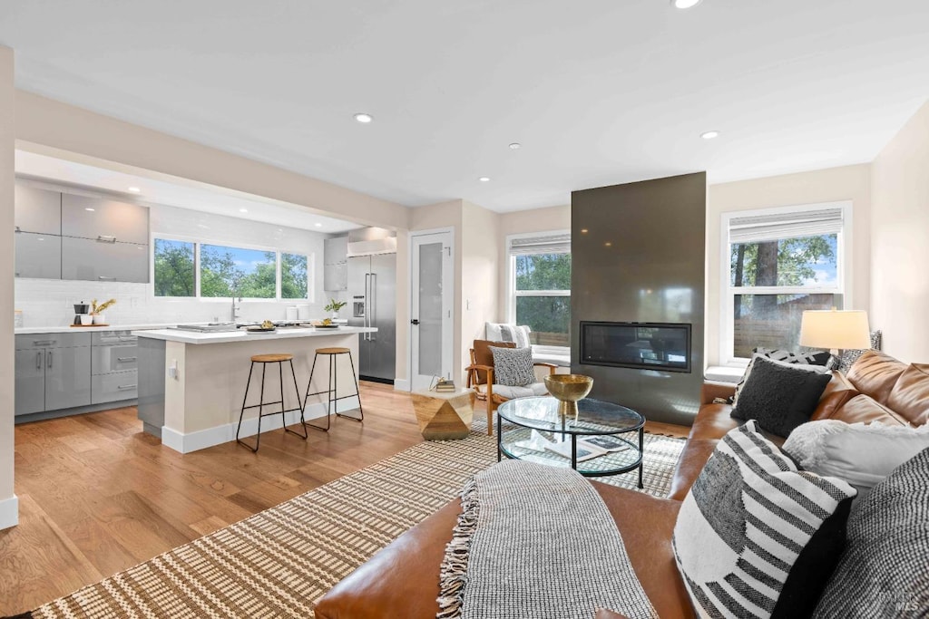 550 Sequoia Dr, San Anselmo, CA 94960 - living room featuring a wealth of natural light, light wood-type flooring, and recessed lighting