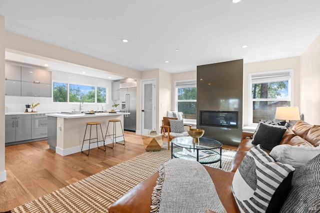550 Sequoia Dr, San Anselmo, CA 94960 - living room featuring a wealth of natural light, light wood-type flooring, and recessed lighting