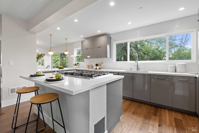 550 Sequoia Dr, San Anselmo, CA 94960 - kitchen with gray cabinets, a sink, visible vents, and stainless steel gas stovetop