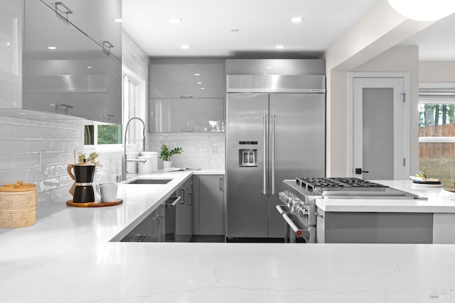 550 Sequoia Dr, San Anselmo, CA 94960 - kitchen with modern cabinets, gray cabinets, a sink, premium appliances, and backsplash