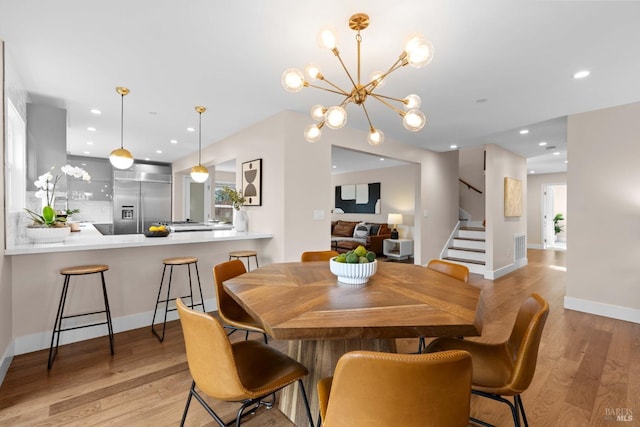 550 Sequoia Dr, San Anselmo, CA 94960 - dining space featuring a chandelier, recessed lighting, stairway, and light wood-style floors