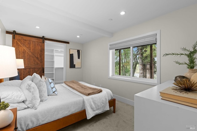 550 Sequoia Dr, San Anselmo, CA 94960 - carpeted bedroom with baseboards, recessed lighting, a walk in closet, a barn door, and beam ceiling
