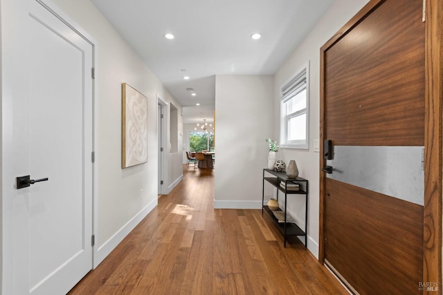 550 Sequoia Dr, San Anselmo, CA 94960 - corridor featuring a chandelier, recessed lighting, baseboards, and wood finished floors