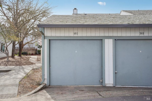 garage featuring fence