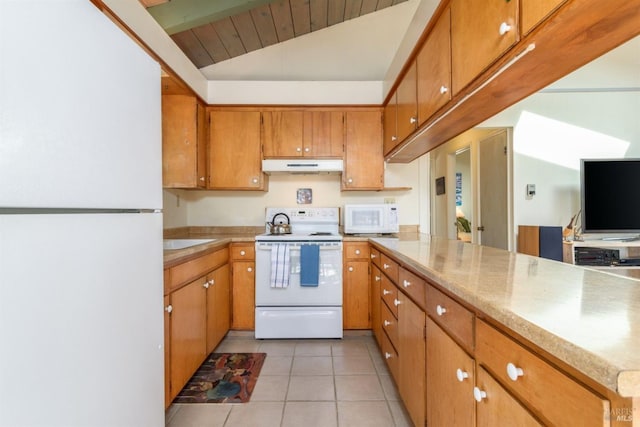 kitchen featuring light tile patterned floors, light countertops, brown cabinetry, white appliances, and under cabinet range hood