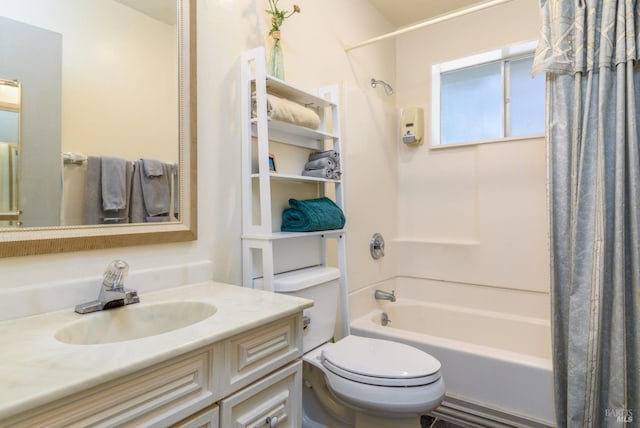 bathroom with vanity, toilet, and shower / bath combo with shower curtain