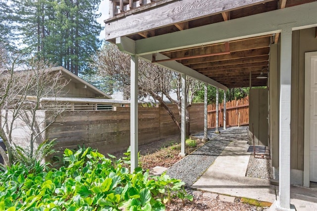 view of patio featuring fence