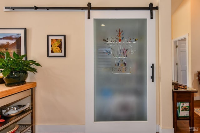 interior details with a barn door