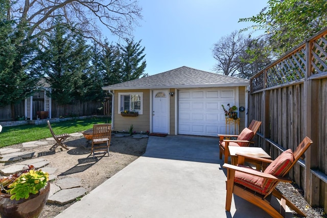 exterior space featuring driveway and fence