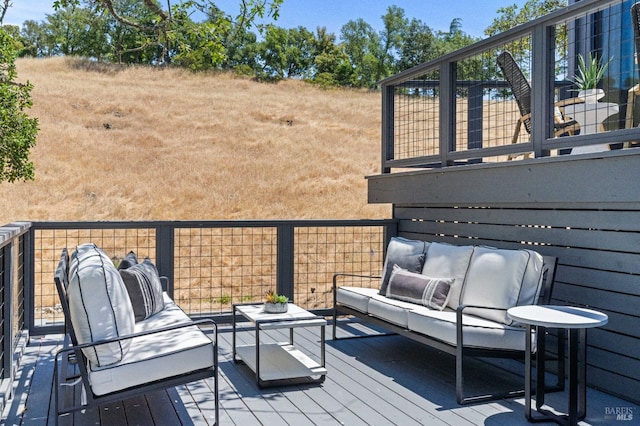 deck featuring an outdoor hangout area