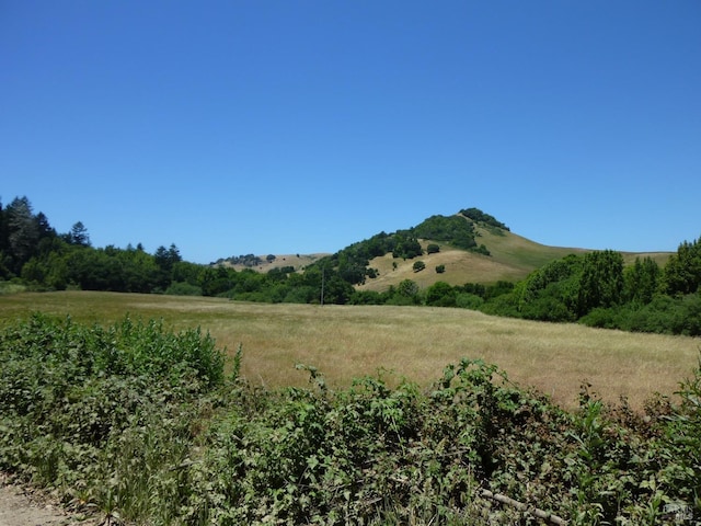 mountain view with a rural view