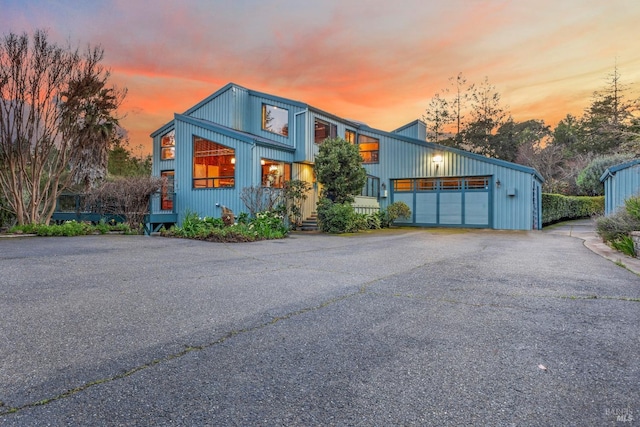 view of front of house with driveway and an attached garage