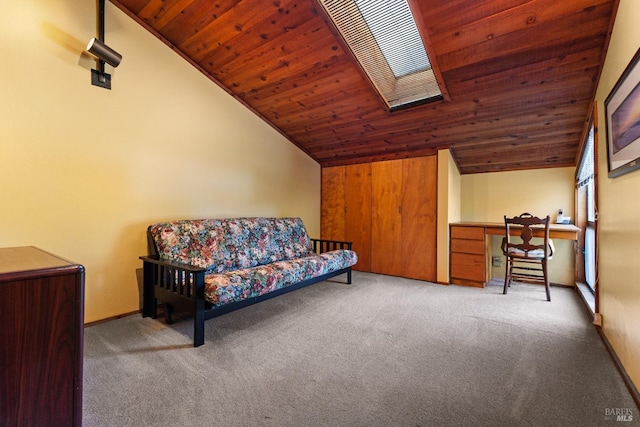 living area featuring carpet floors, wooden ceiling, and built in desk