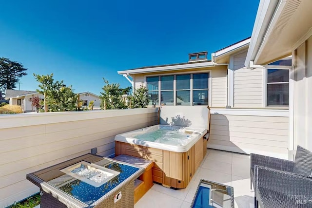 view of patio / terrace featuring a hot tub