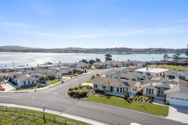 aerial view with a residential view and a water view