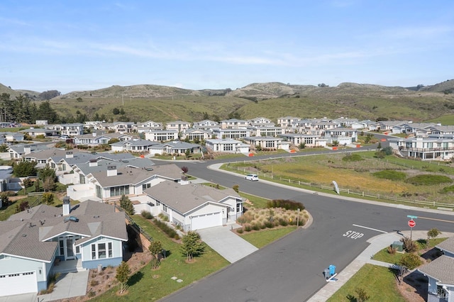 bird's eye view with a residential view and a mountain view