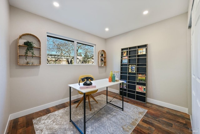 office space with baseboards, wood finished floors, and recessed lighting